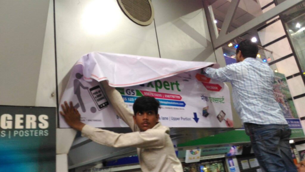 Flex Signboard Banner Designing, Printing and Installation for Mac Xpert Mumbai by Creativo Camaal